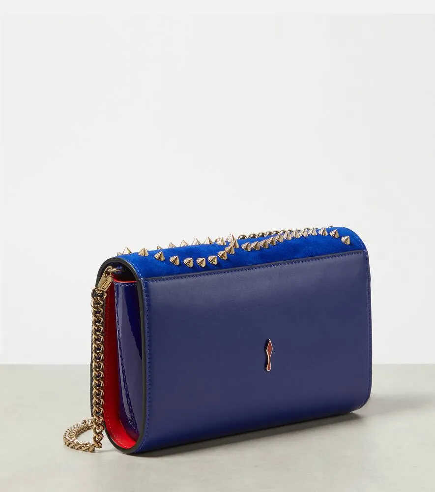 Christian Louboutin Paloma embellished suede and leather clutch