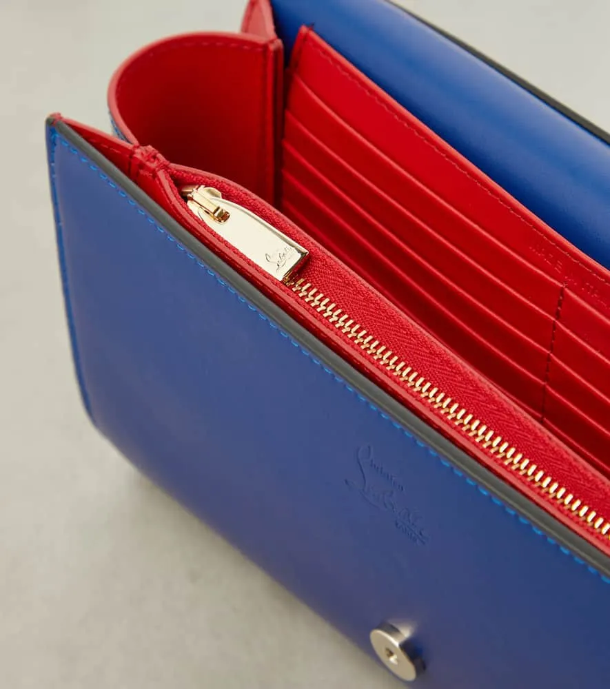 Christian Louboutin Paloma embellished suede and leather clutch